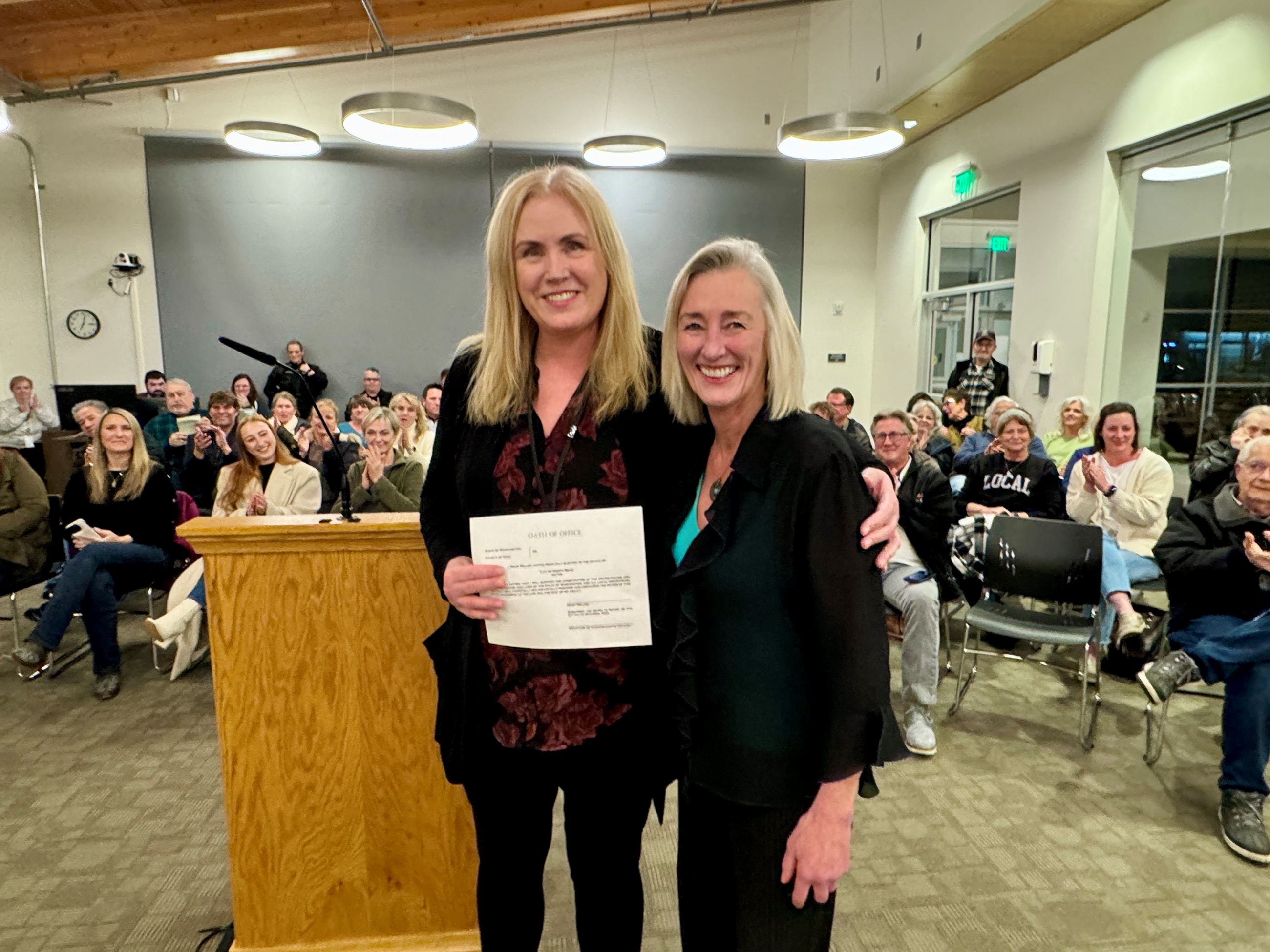 Mayor Mary Miller being sworn in by City Clerk Susie Oppedal